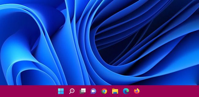 Uma barra de tarefas do Windows 11 com cores aplicadas.