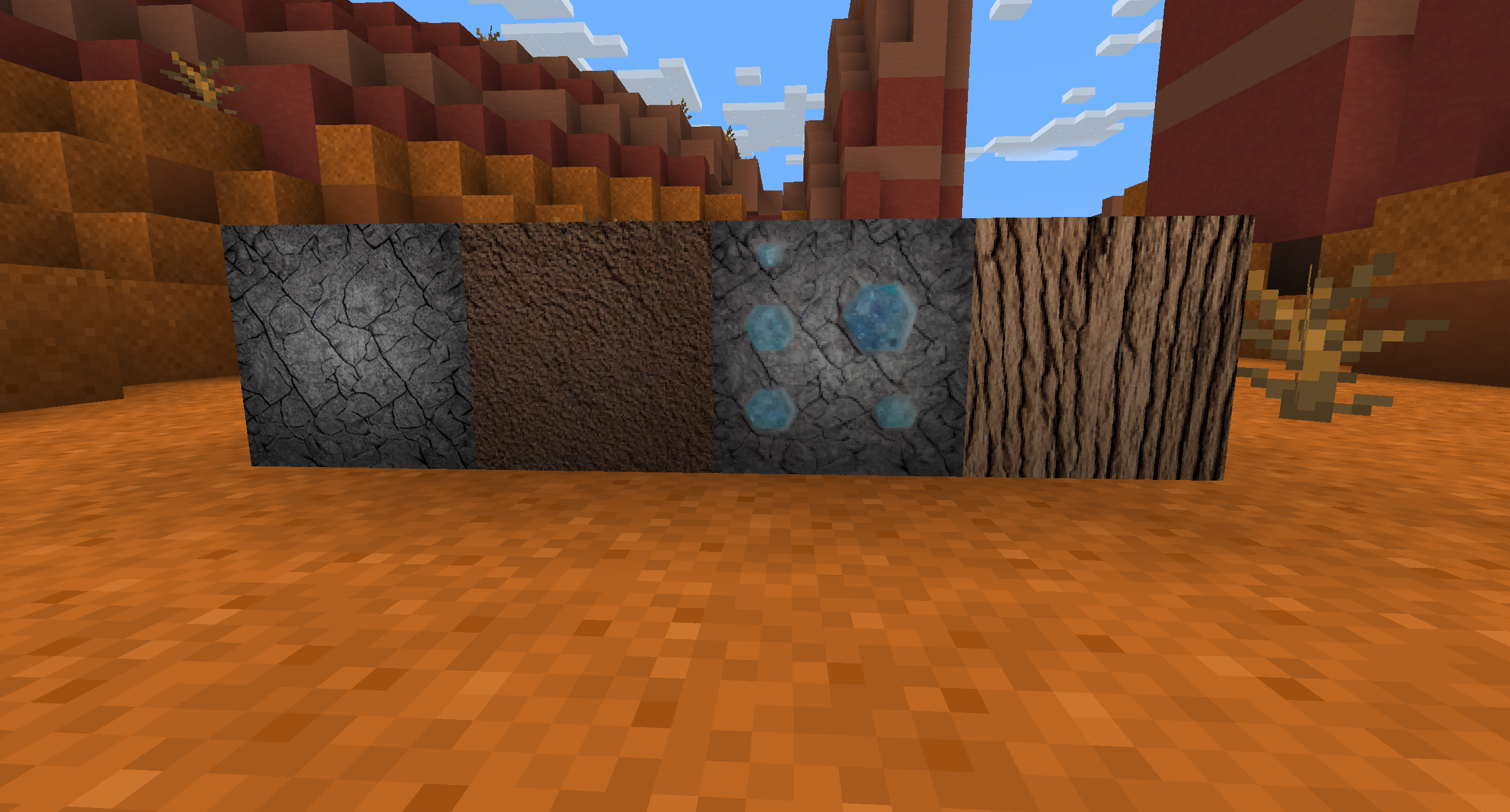 Nossas texturas exibidas no Minecraft.  Da esquerda para a direita: Pedra, Sujeira, Minério de Diamante, Carvalho.