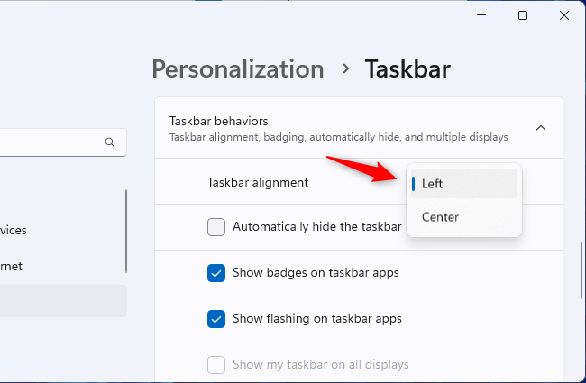 Selecione “Esquerda” ou “Centro” em Alinhamento da barra de tarefas.