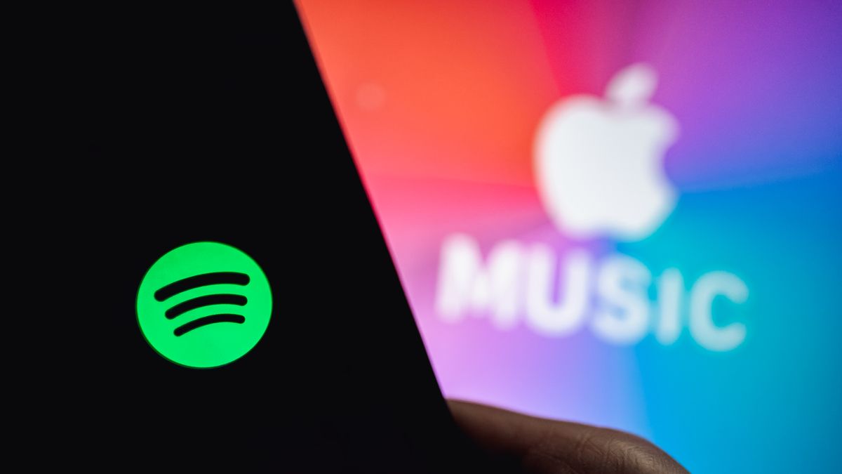 Logotipos do Spotify e da Apple Music lado a lado