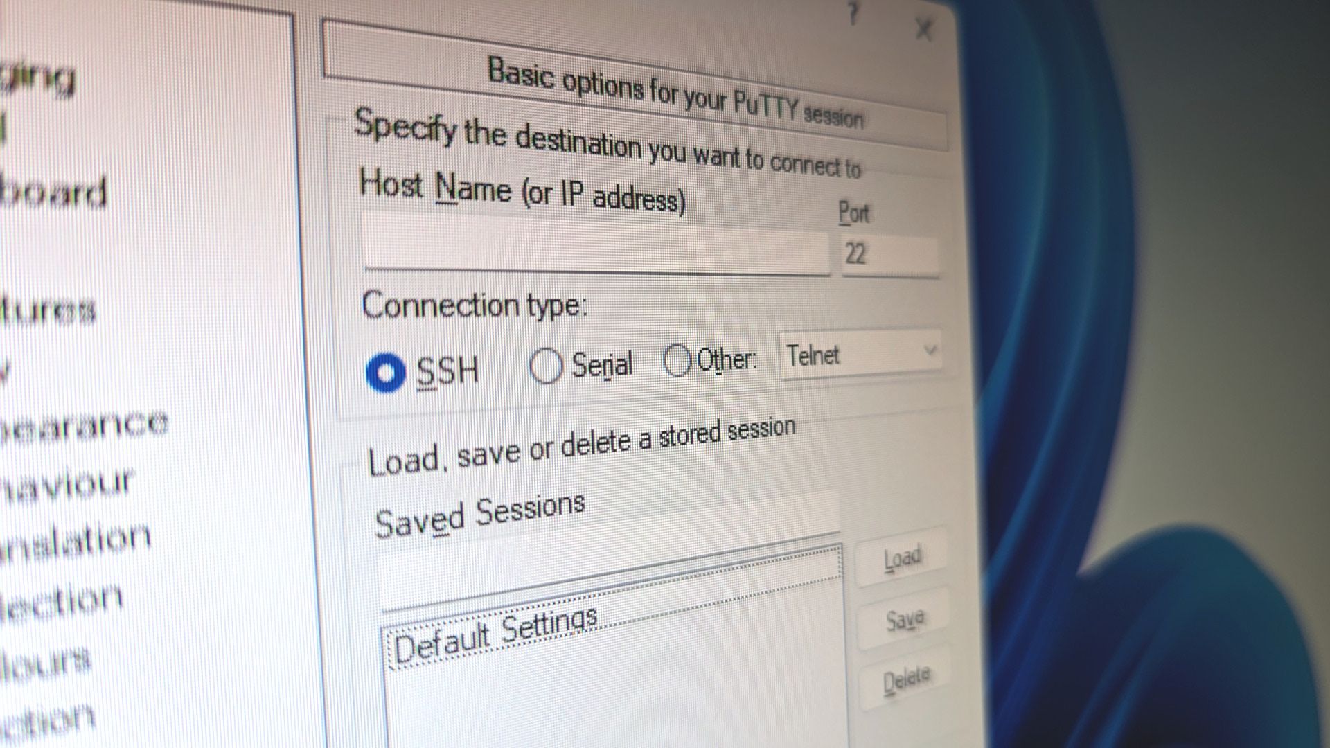 Close de uma tela de computador com opções de configuração do PuTTY visíveis.