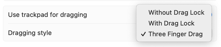 Ative o arrastar com três dedos nas configurações de acessibilidade do macOS