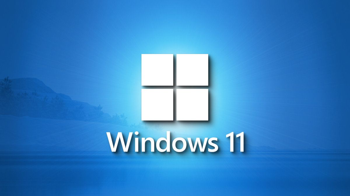 Um impressionante logotipo do Windows 11 em uma paisagem sombreada em azul